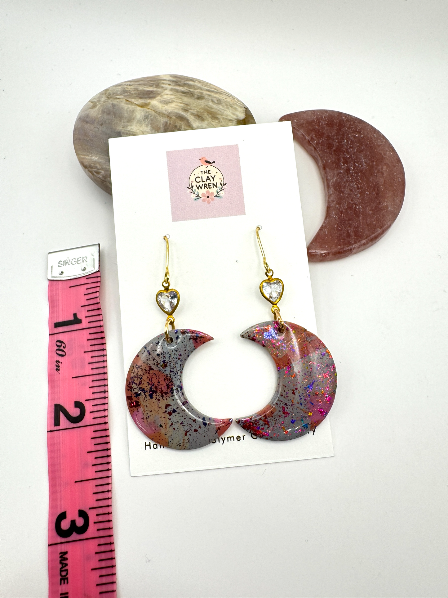 Large rainbow moons with heart charm